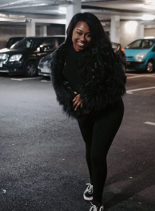 Marcelle Adrianna in a black faux fur jacket